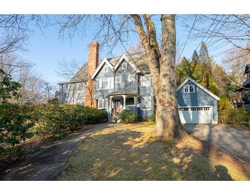 95 Suffolk Road Newton, MA 02467 - Photo 1 of 26 a front view of a house with a yard