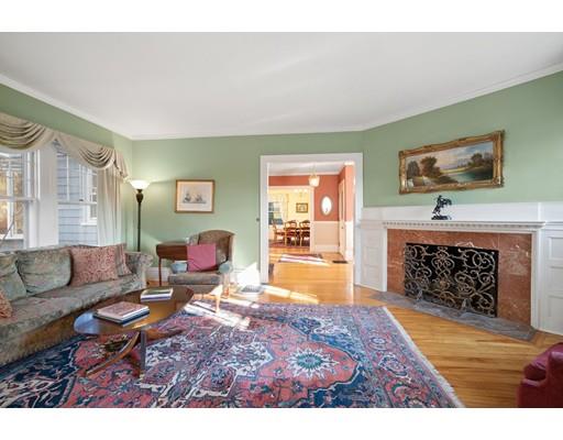 95 Suffolk Road Newton, MA 02467 - Photo 3 of 26 a living room with furniture and a fireplace