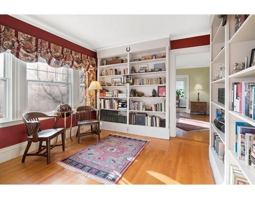 95 Suffolk Road Newton, MA 02467 - Photo 4 of 26 a room with furniture and a book shelf