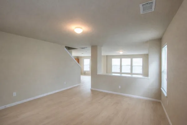 an empty room with windows