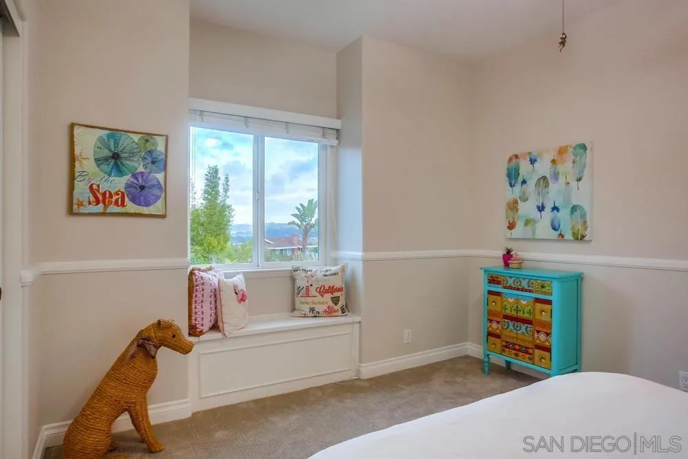 2234 Ivy Road Oceanside, CA 92054 - Photo 24 of 29 a room with toys and a window