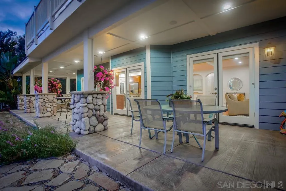 2234 Ivy Road Oceanside, CA 92054 - Photo 7 of 29 a view of a dining room with furniture and a potted plant