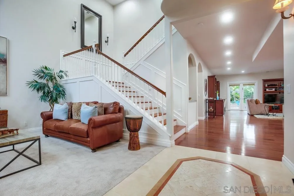 2234 Ivy Road Oceanside, CA 92054 - Photo 9 of 29 a living room with furniture and wooden floor