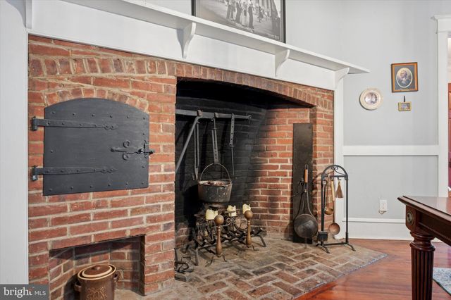 a view of front door and wooden floor