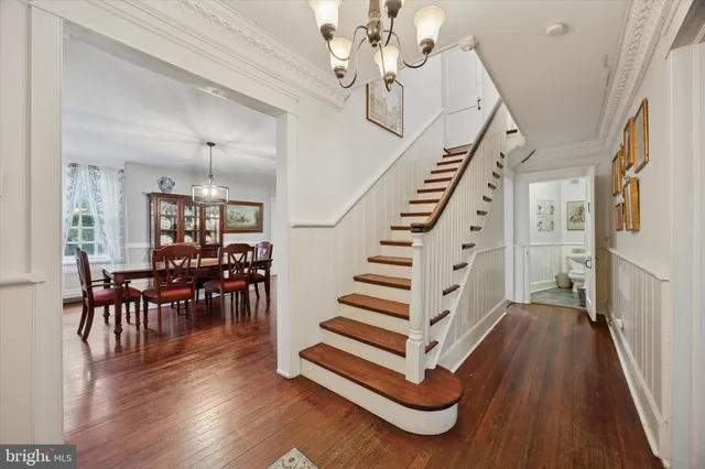 a view of a livingroom with furniture and wooden floor
