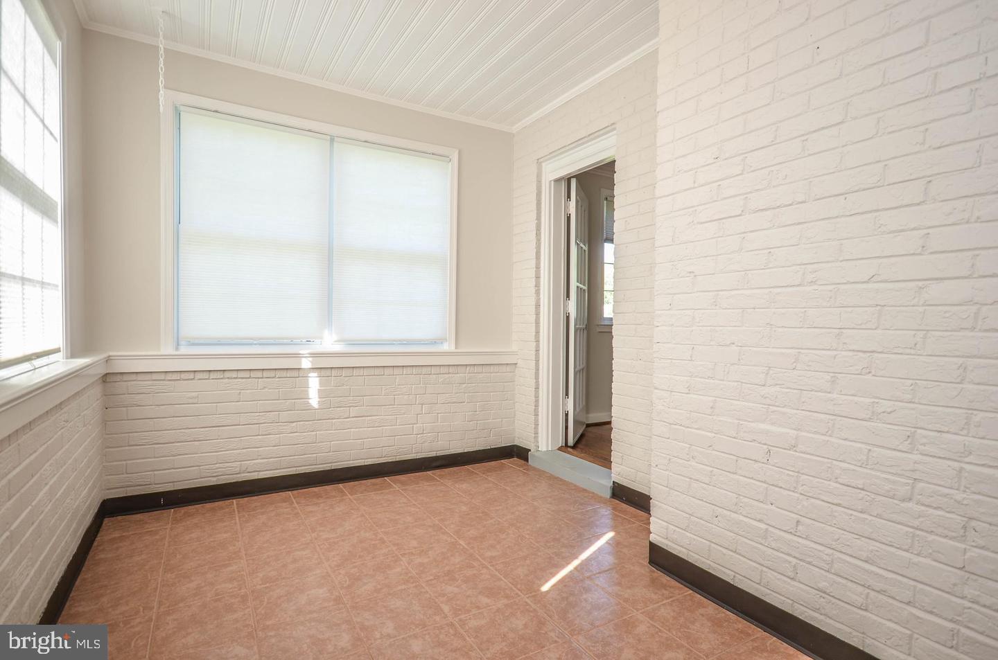 2315 Plyers Mill Road Silver Spring, MD 20902 - Photo 22 of 28 a view of an empty room with a window