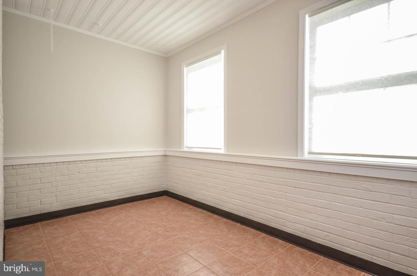 2315 Plyers Mill Road Silver Spring, MD 20902 - Photo 23 of 28 a view of an empty room with a window