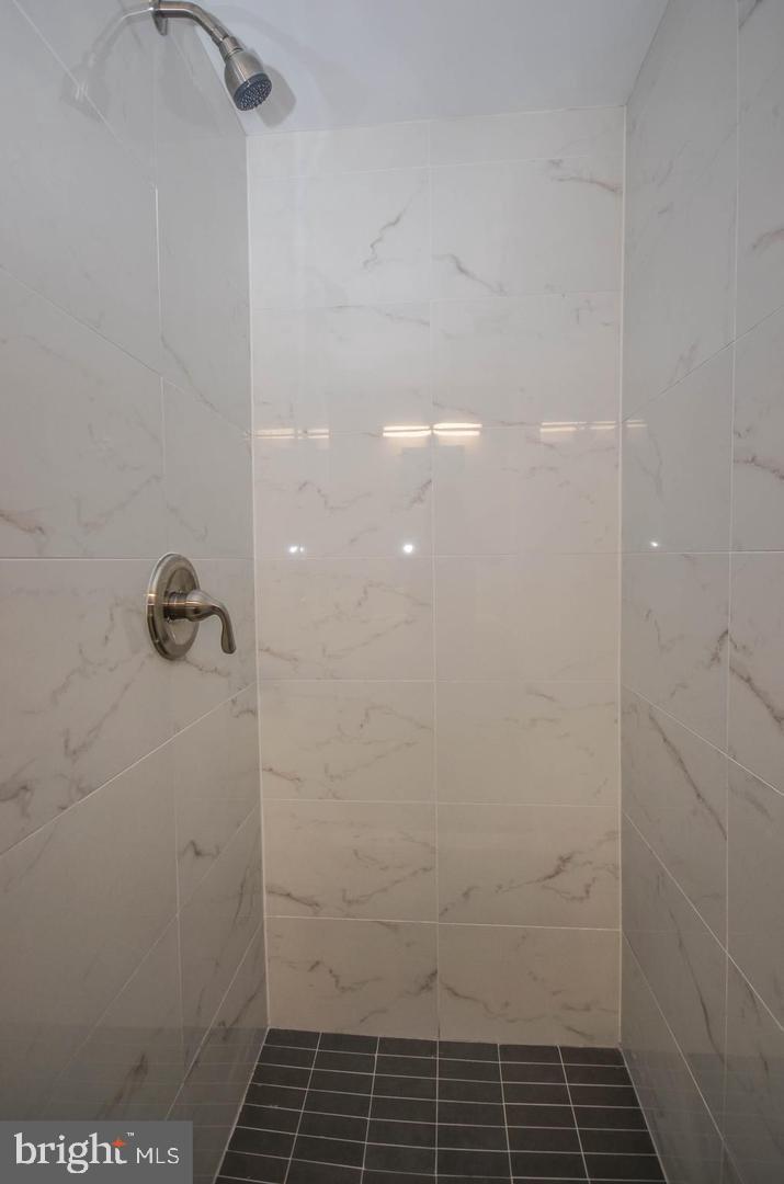 2315 Plyers Mill Road Silver Spring, MD 20902 - Photo 25 of 28 a bathroom with a shower