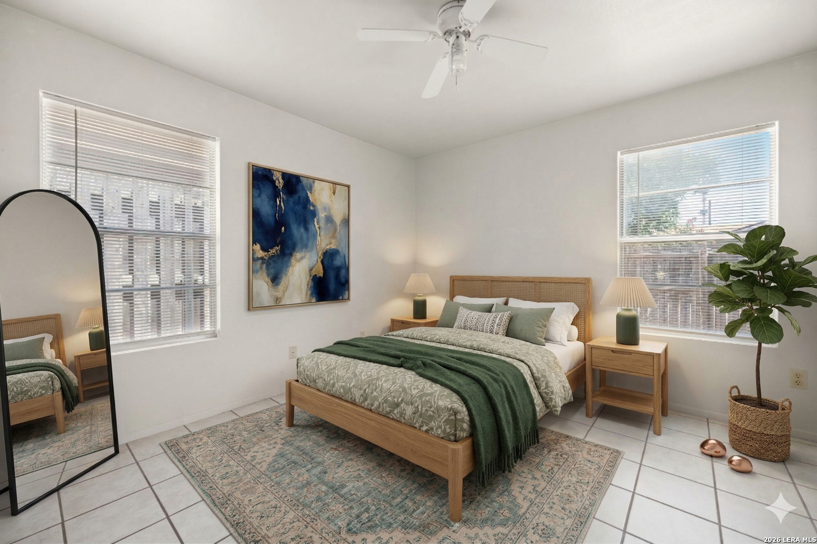 1118 West Goodwin Street Pleasanton, TX 78064 - Photo 16 of 23 a bedroom with a balcony a bed and a potted plant