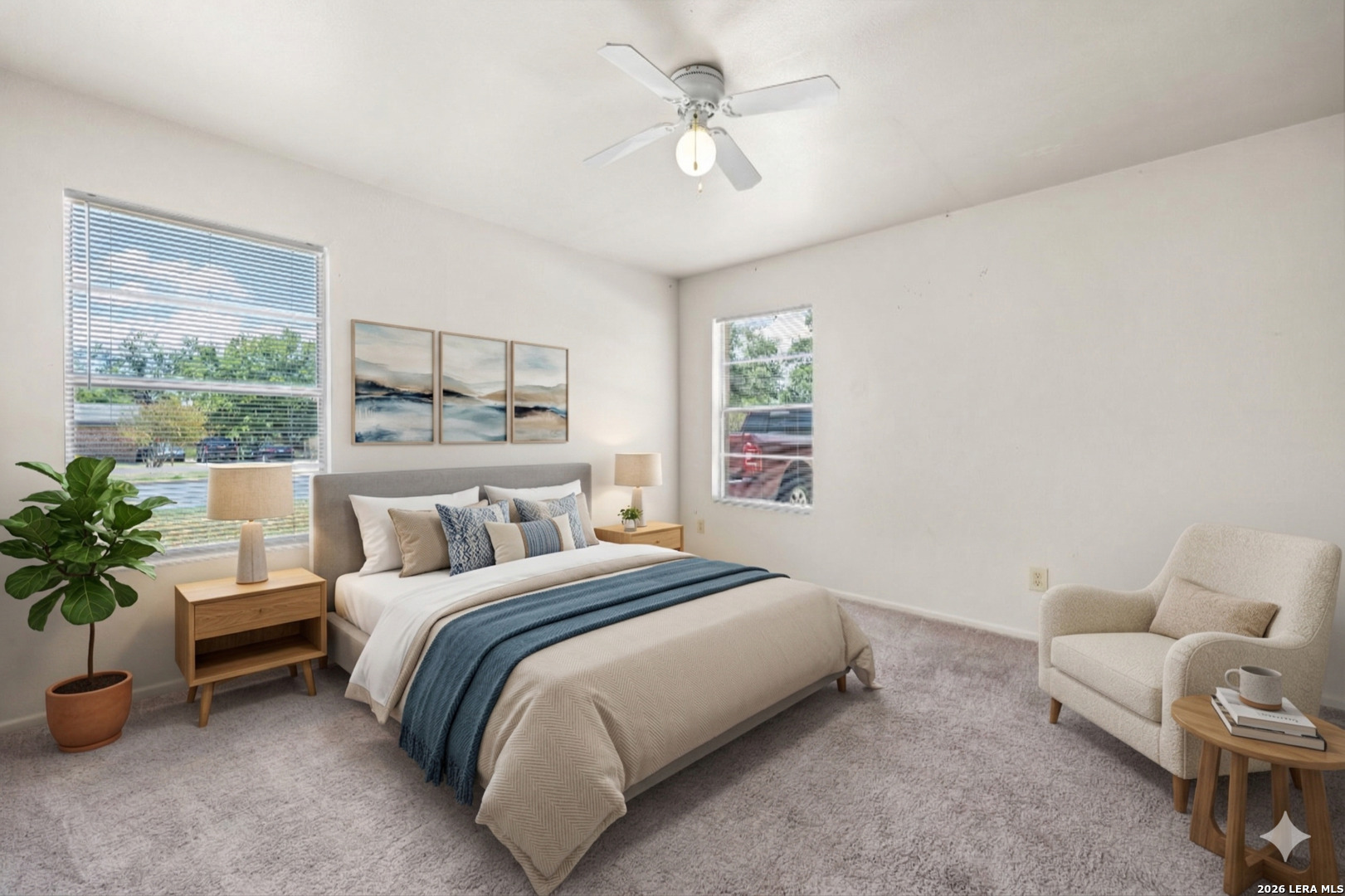 1118 West Goodwin Street Pleasanton, TX 78064 - Photo 6 of 23 a bedroom with a bed furniture potted plant and a window