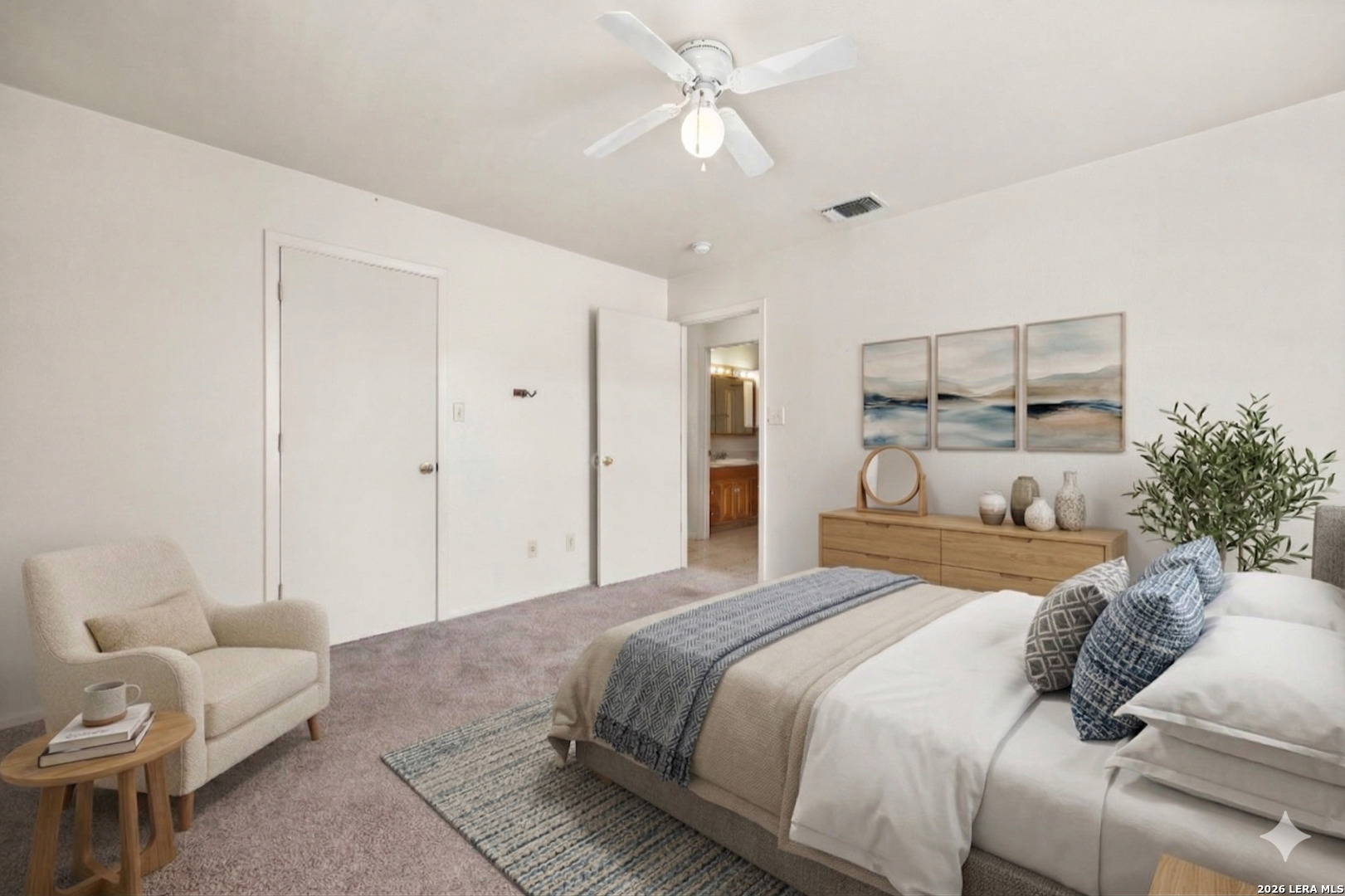 1118 West Goodwin Street Pleasanton, TX 78064 - Photo 7 of 23 a bedroom with a bed and a couch