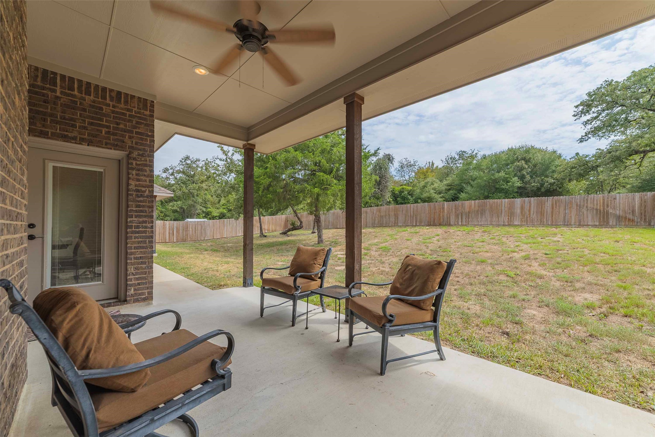 9695 County Road 321 Caldwell, TX 77836 - Photo 19 of 40 a living room with couches and pool view