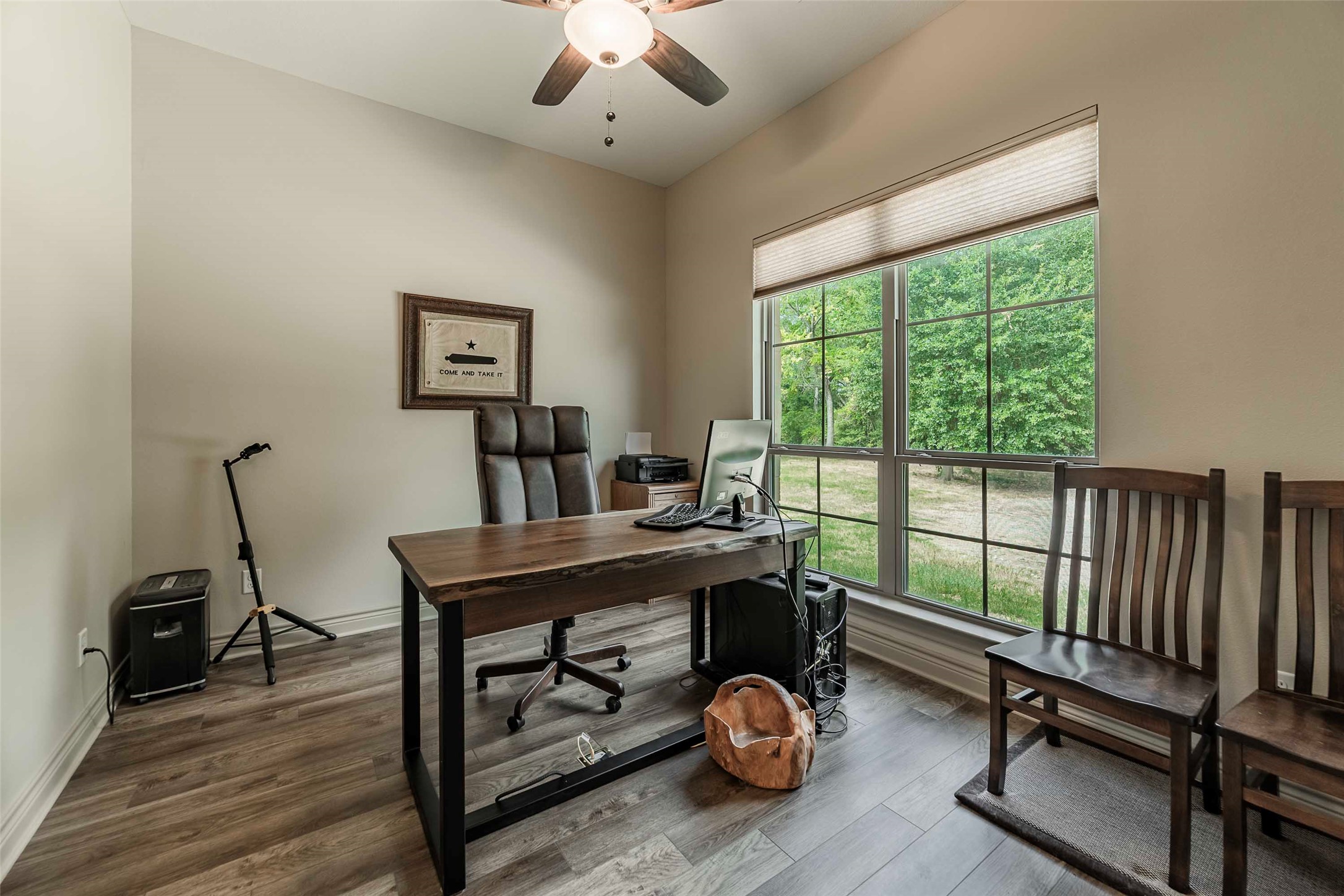 9695 County Road 321 Caldwell, TX 77836 - Photo 20 of 40 a view of a workspace with furniture and a window
