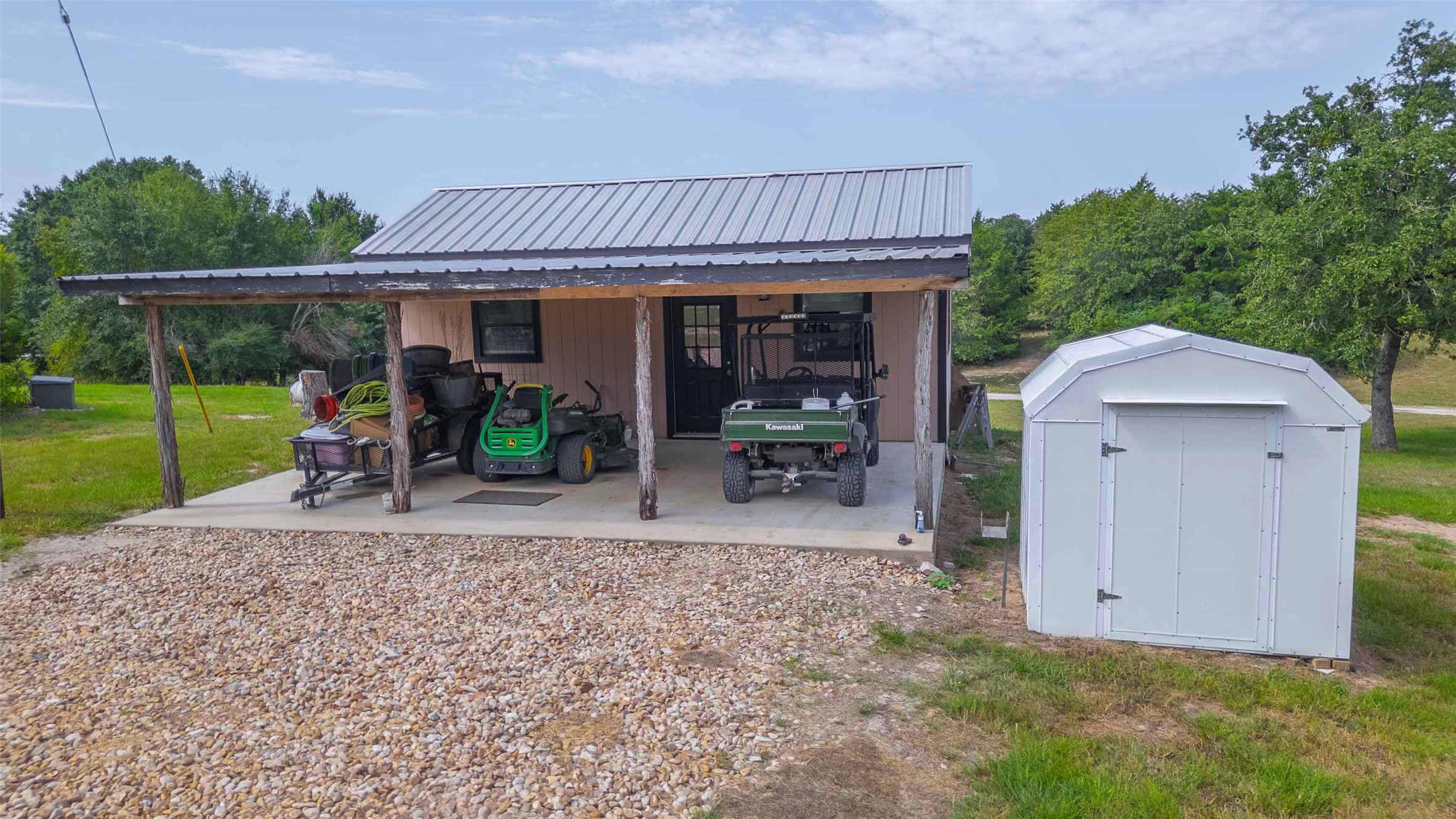 9695 County Road 321 Caldwell, TX 77836 - Photo 27 of 40 a view of a house with porch and garden