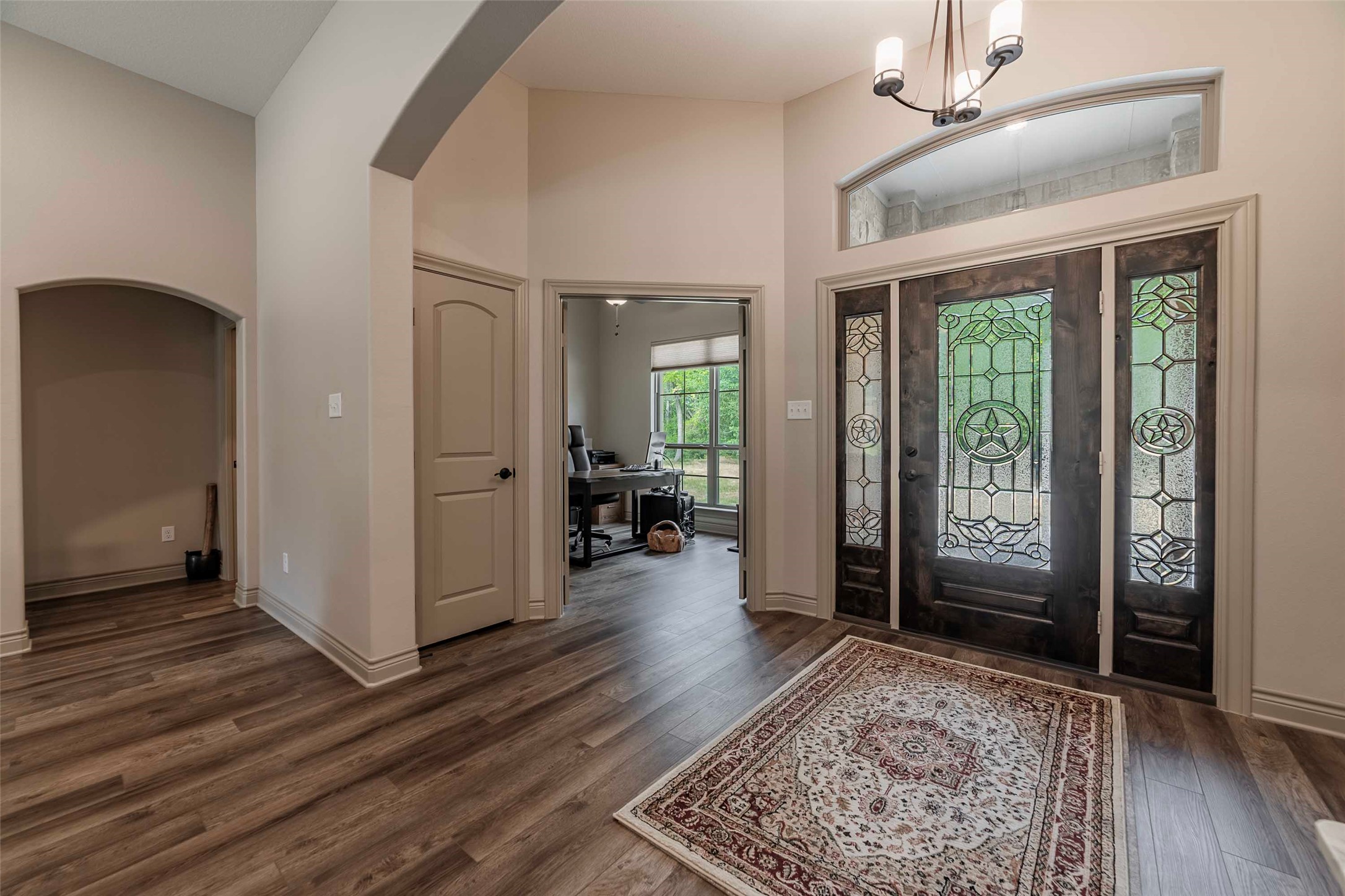 9695 County Road 321 Caldwell, TX 77836 - Photo 3 of 40 wooden floor with a chandelier