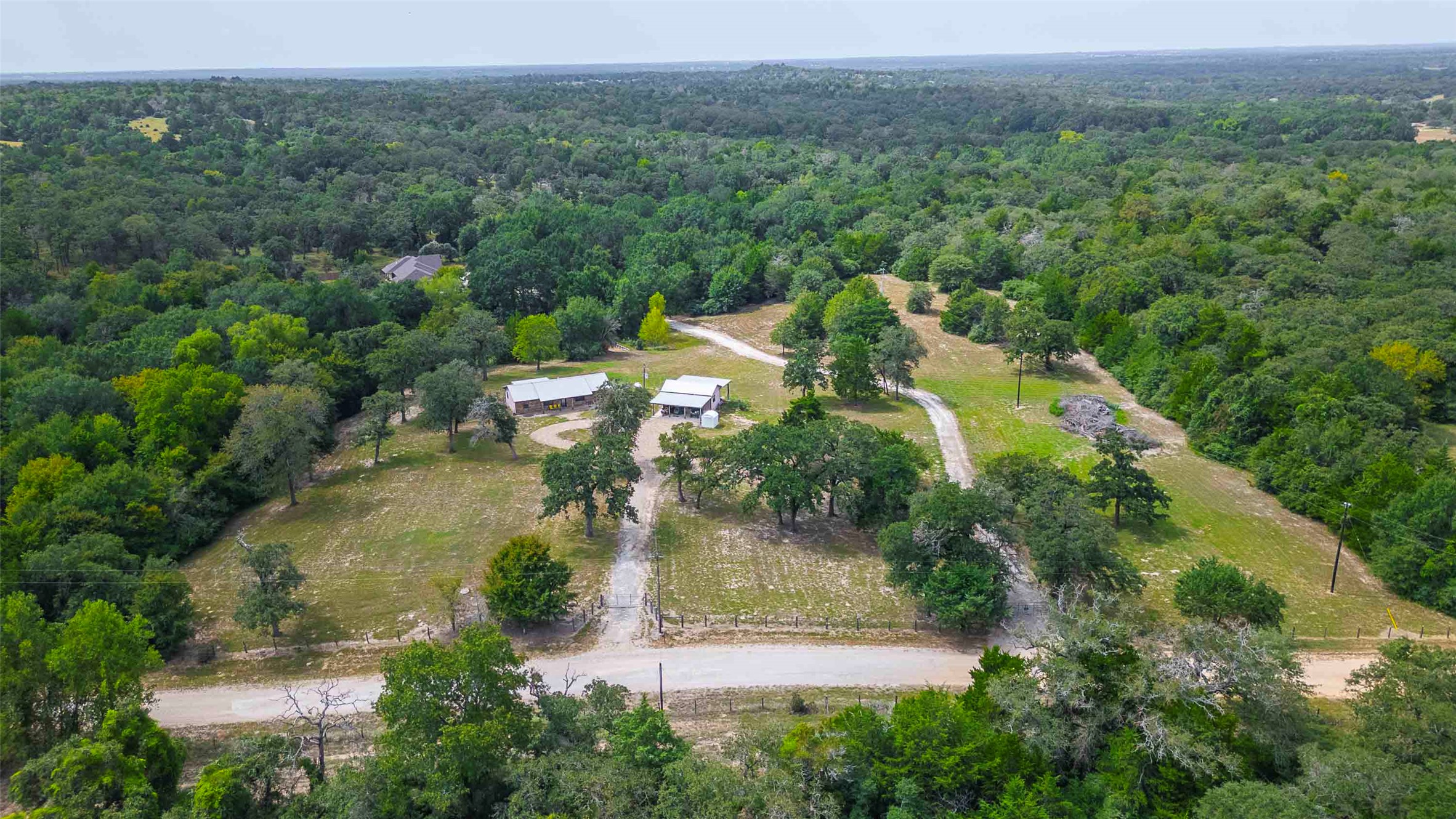 9695 County Road 321 Caldwell, TX 77836 - Photo 40 of 40 an aerial view of a house with mountain view