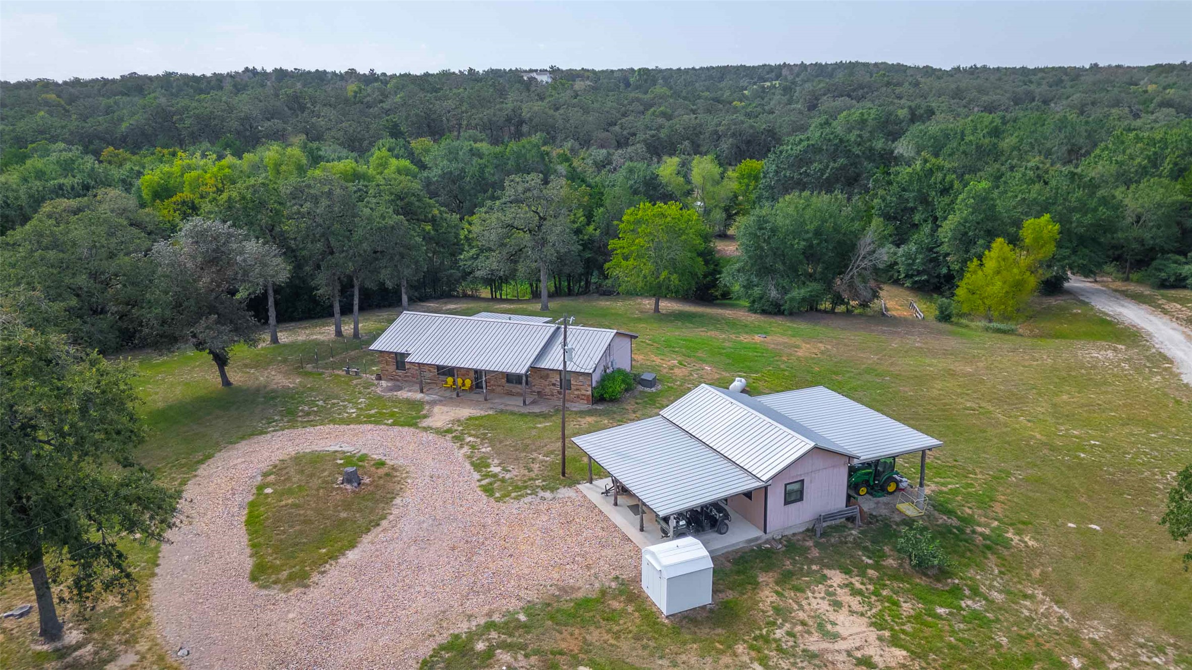 9695 County Road 321 Caldwell, TX 77836 - Photo 4 of 40 an aerial view of a house with pool big yard