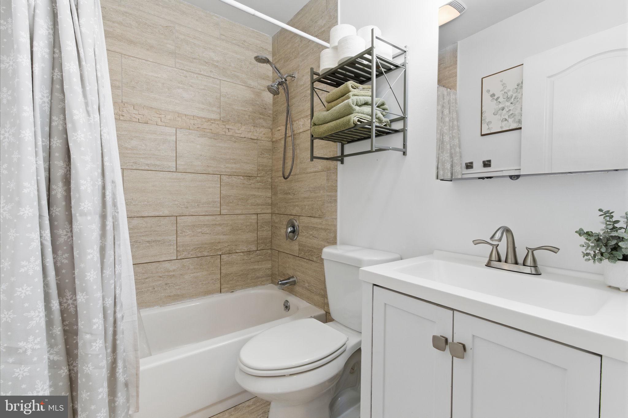 62 Oldbrook Road Levittown, PA 19057 - Photo 12 of 18 a bathroom with a sink toilet and shower