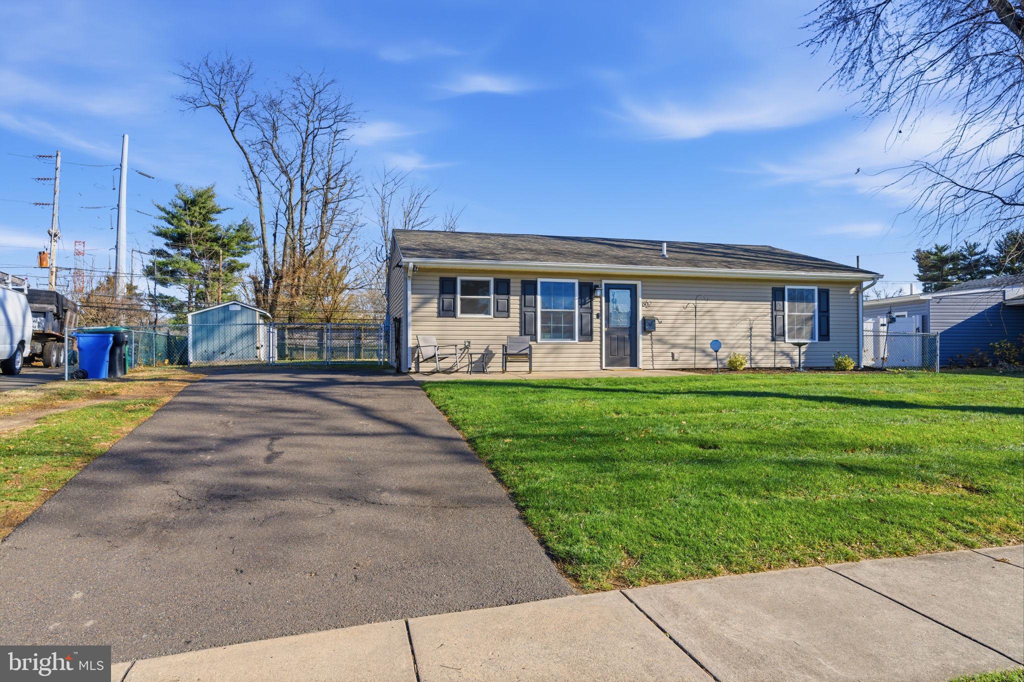 62 Oldbrook Road Levittown, PA 19057 - Photo 7 of 18 a front view of house with yard and green space