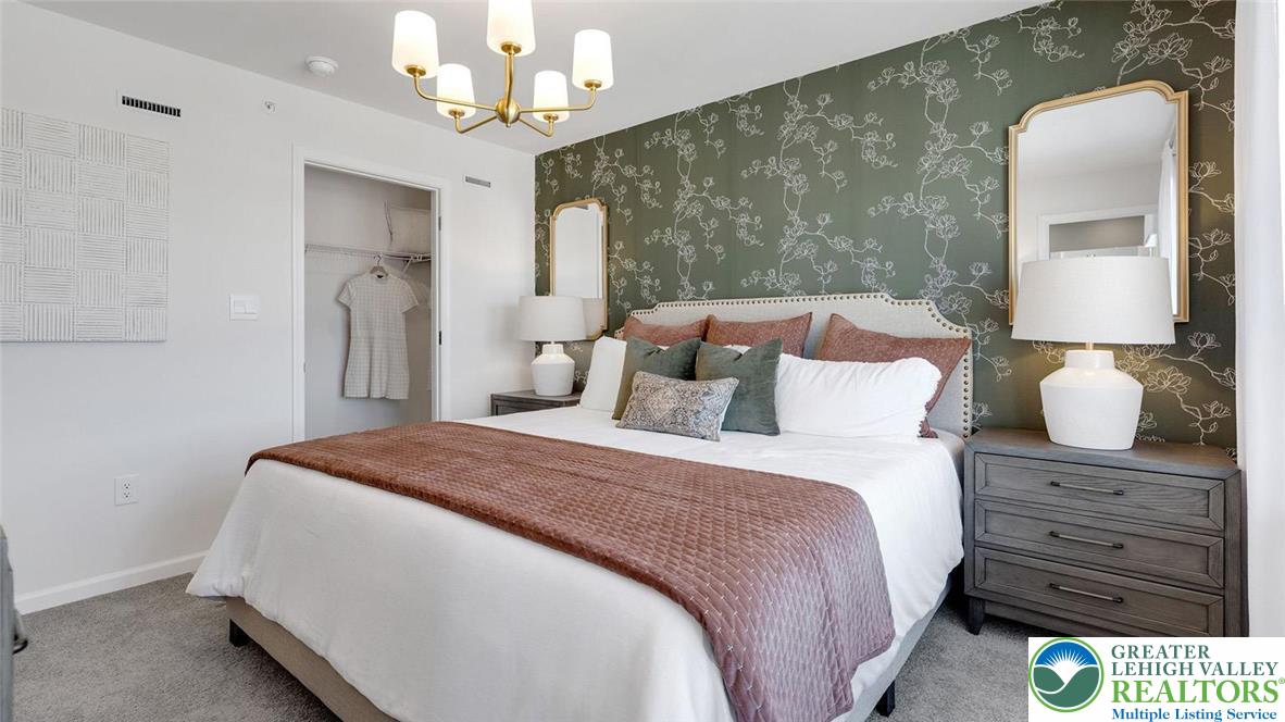 8344 Alexander Court Breinigsville, PA 18031 - Photo 19 of 25 a bedroom with a bed and a dresser