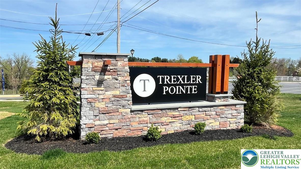 8344 Alexander Court Breinigsville, PA 18031 - Photo 2 of 25 a sign on the side of a building