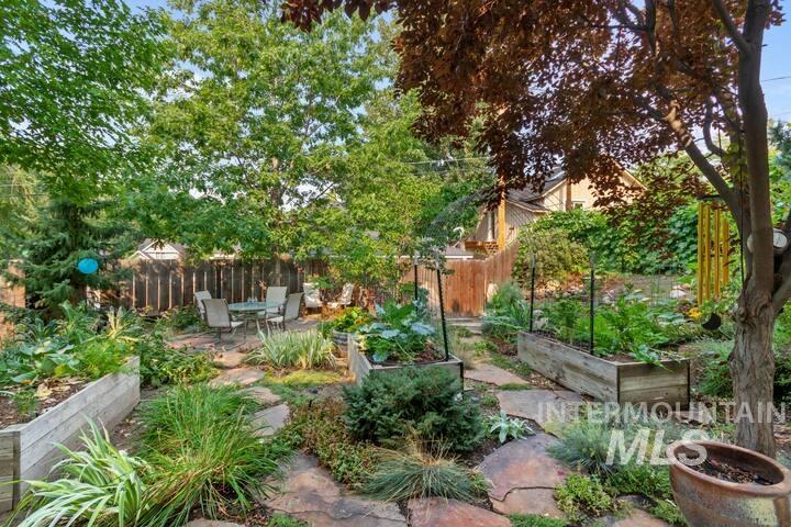 1617 North 5th Street Boise, ID 83702 - Photo 33 of 36 View of yard featuring a vegetable garden and a patio area