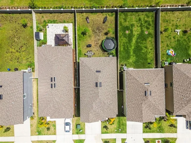 aerial view of a house with a swimming pool