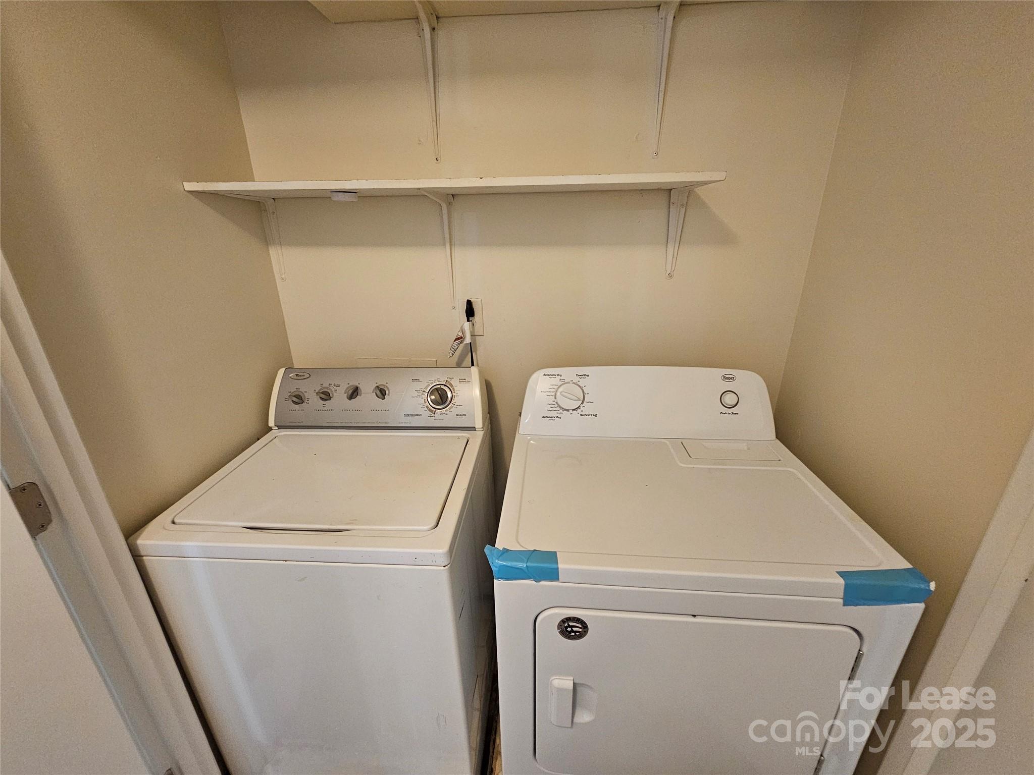 9619 Vinca Circle, Unit B Charlotte, NC 28213 - Photo 18 of 18 a utility room with dryer and washer