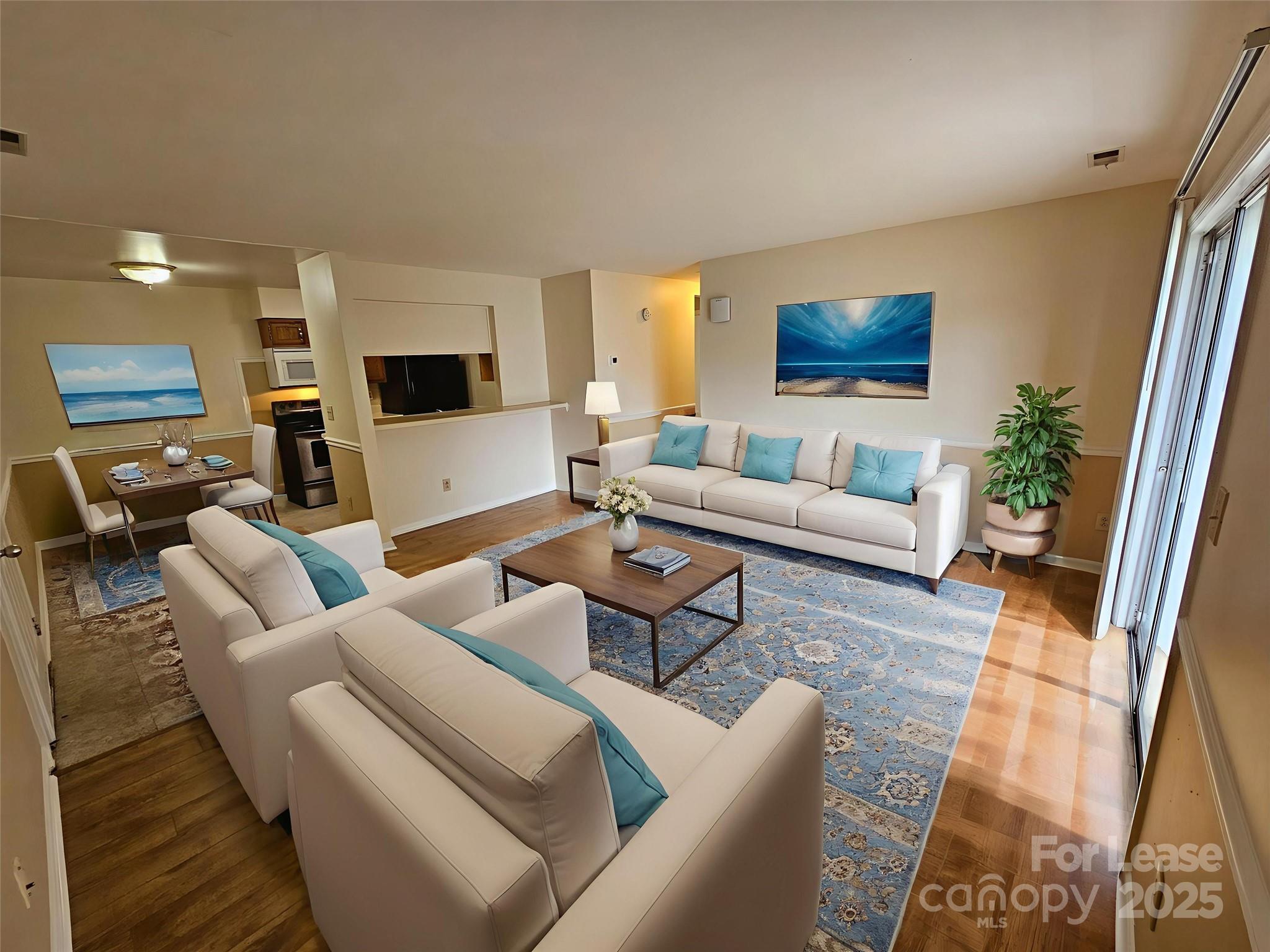 9619 Vinca Circle, Unit B Charlotte, NC 28213 - Photo 4 of 18 a living room with furniture and a flat screen tv