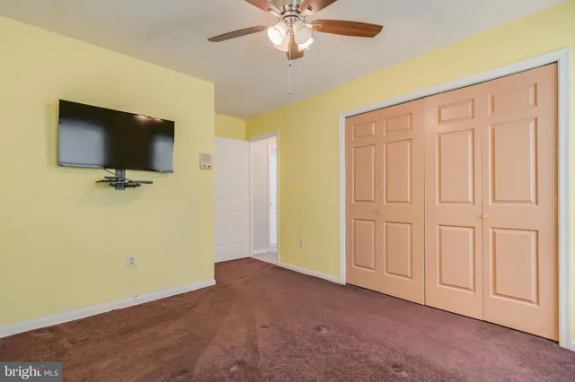 a view of a livingroom with a flat screen tv