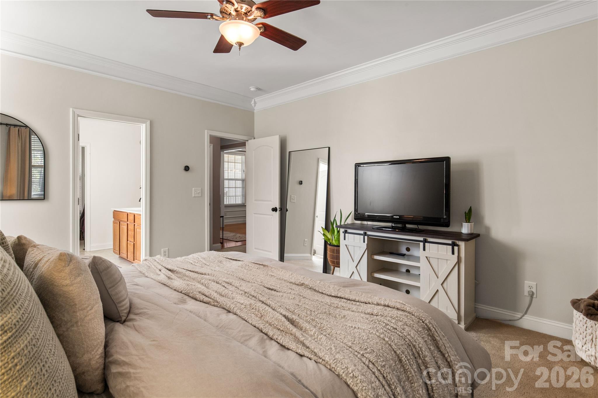 2341 Valley Meadows Drive York, SC 29745 - Photo 20 of 46 a bedroom with a bed and a flat screen tv