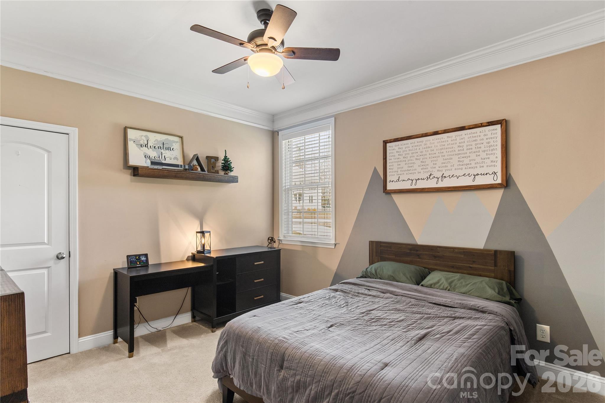 2341 Valley Meadows Drive York, SC 29745 - Photo 24 of 46 a bedroom with a bed and a chandelier