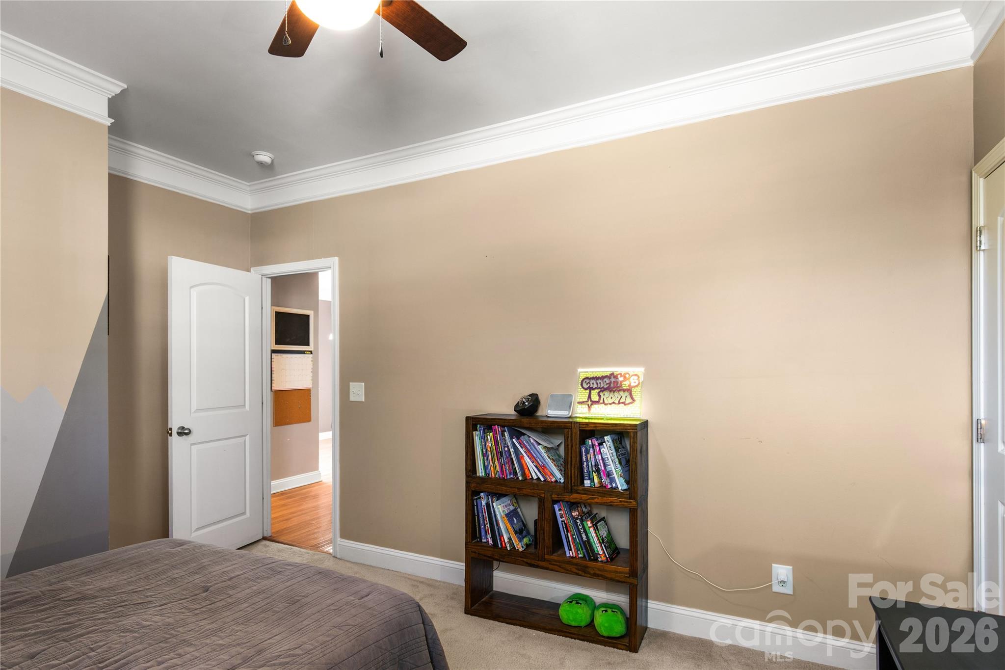 2341 Valley Meadows Drive York, SC 29745 - Photo 25 of 46 a bedroom with furniture and a book shelf