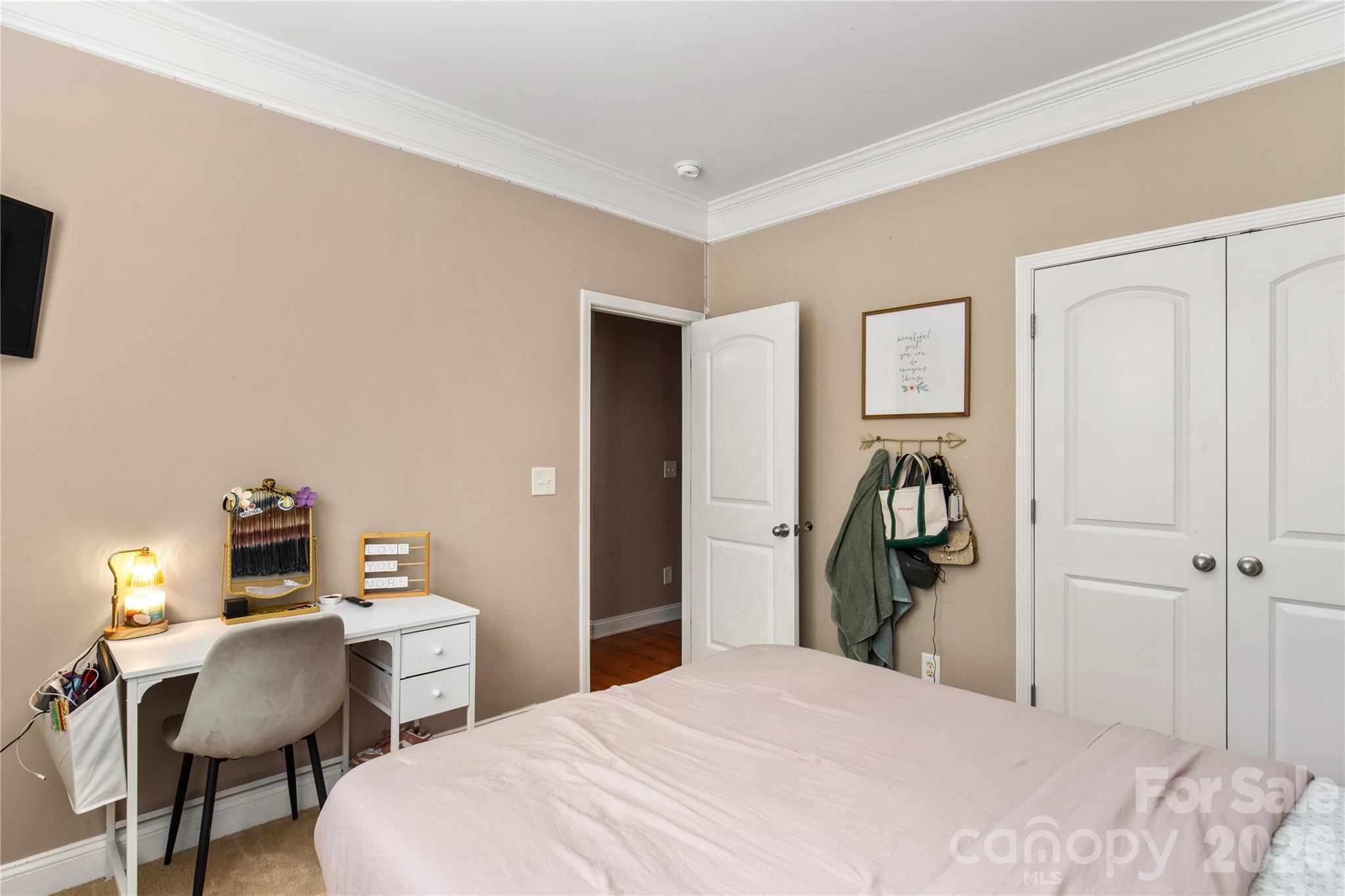 2341 Valley Meadows Drive York, SC 29745 - Photo 27 of 46 a bedroom with a bed and a desk in it
