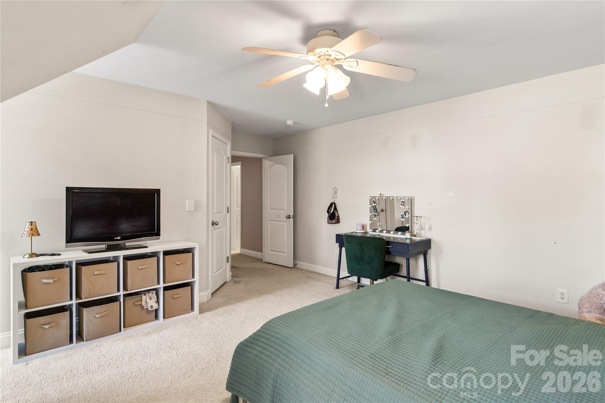 2341 Valley Meadows Drive York, SC 29745 - Photo 31 of 46 a bedroom with a bed and a flat screen tv