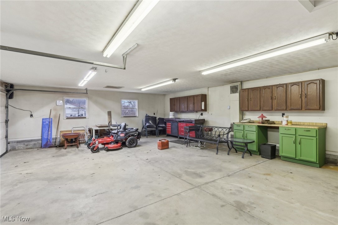 9701 Hoose Road Mentor, OH 44060 - Photo 34 of 45 Back Garage with a workshop area