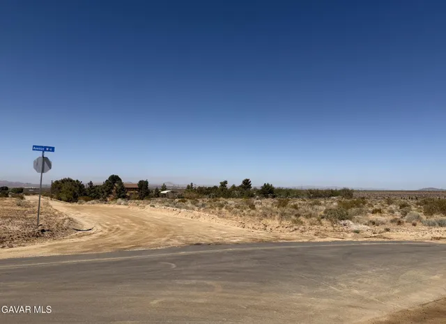 a view of ocean with sunset