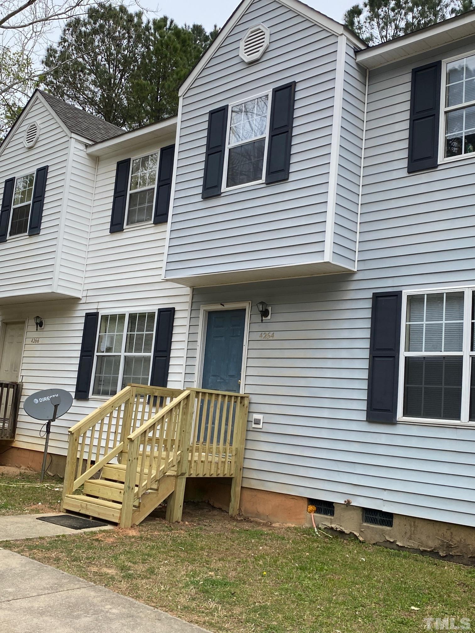 4264 Kaplan Drive Raleigh, NC 27606 - Photo 1 of 23 a view of a house with a yard