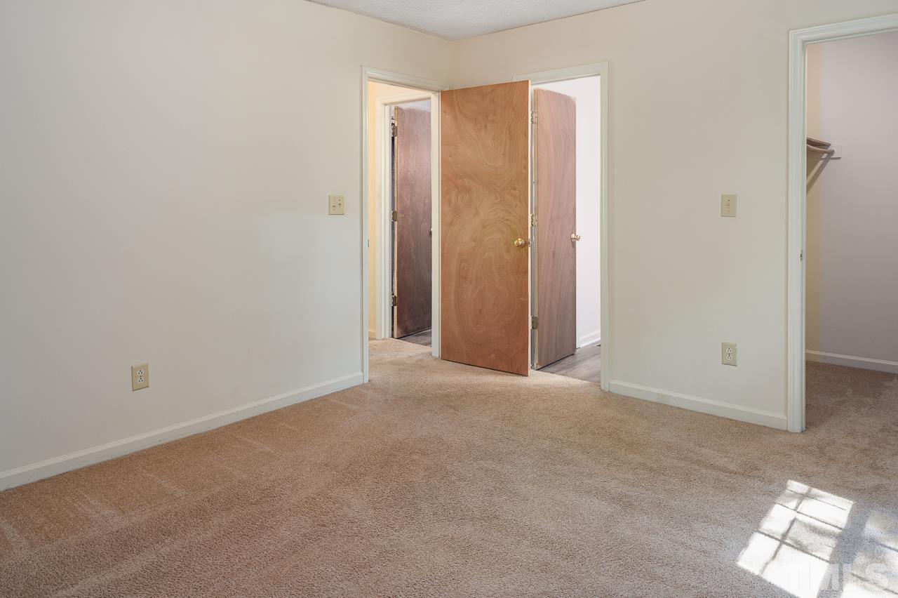 4264 Kaplan Drive Raleigh, NC 27606 - Photo 13 of 23 an empty room with closet area