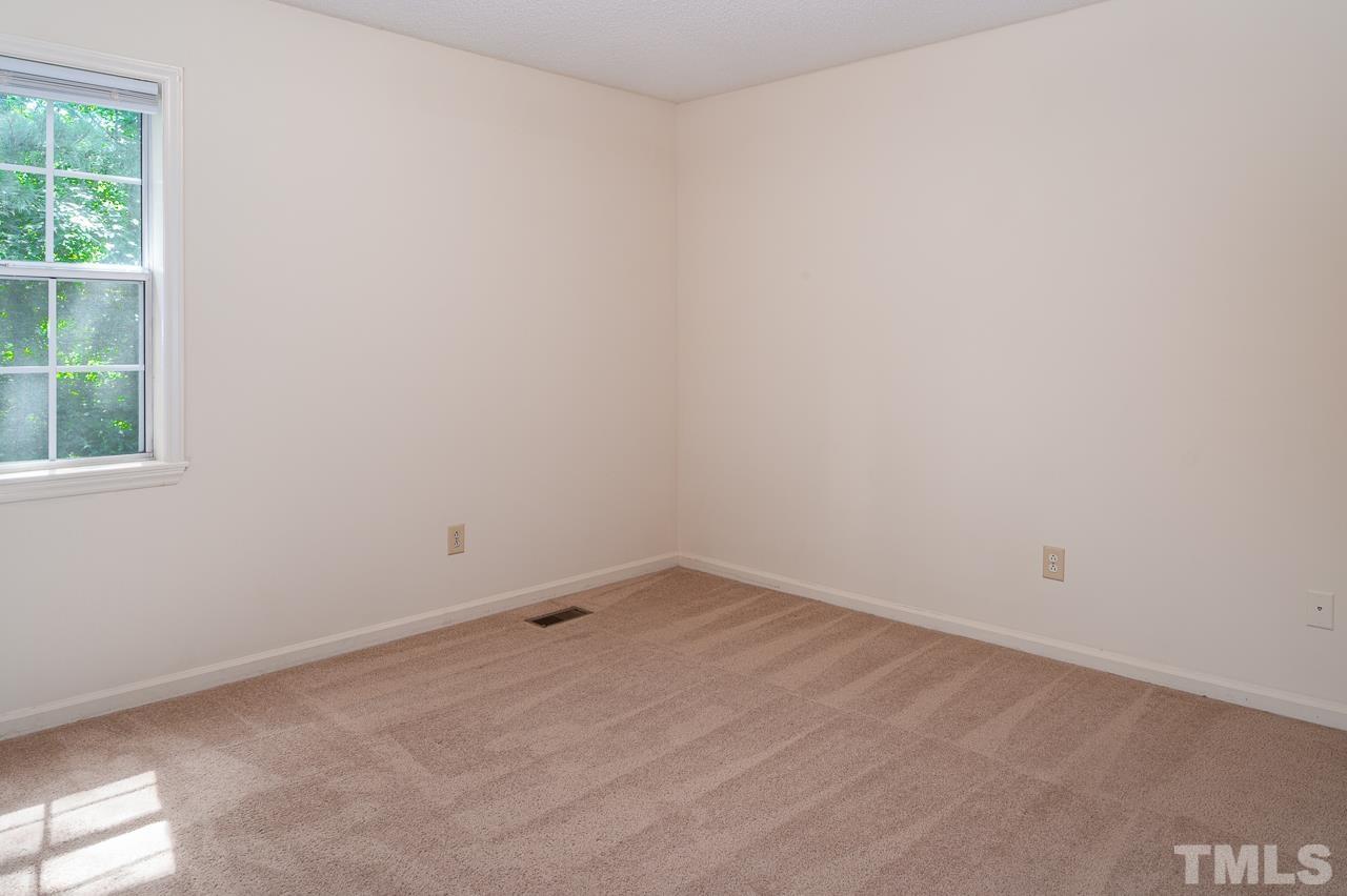 4264 Kaplan Drive Raleigh, NC 27606 - Photo 16 of 23 an empty room with a window