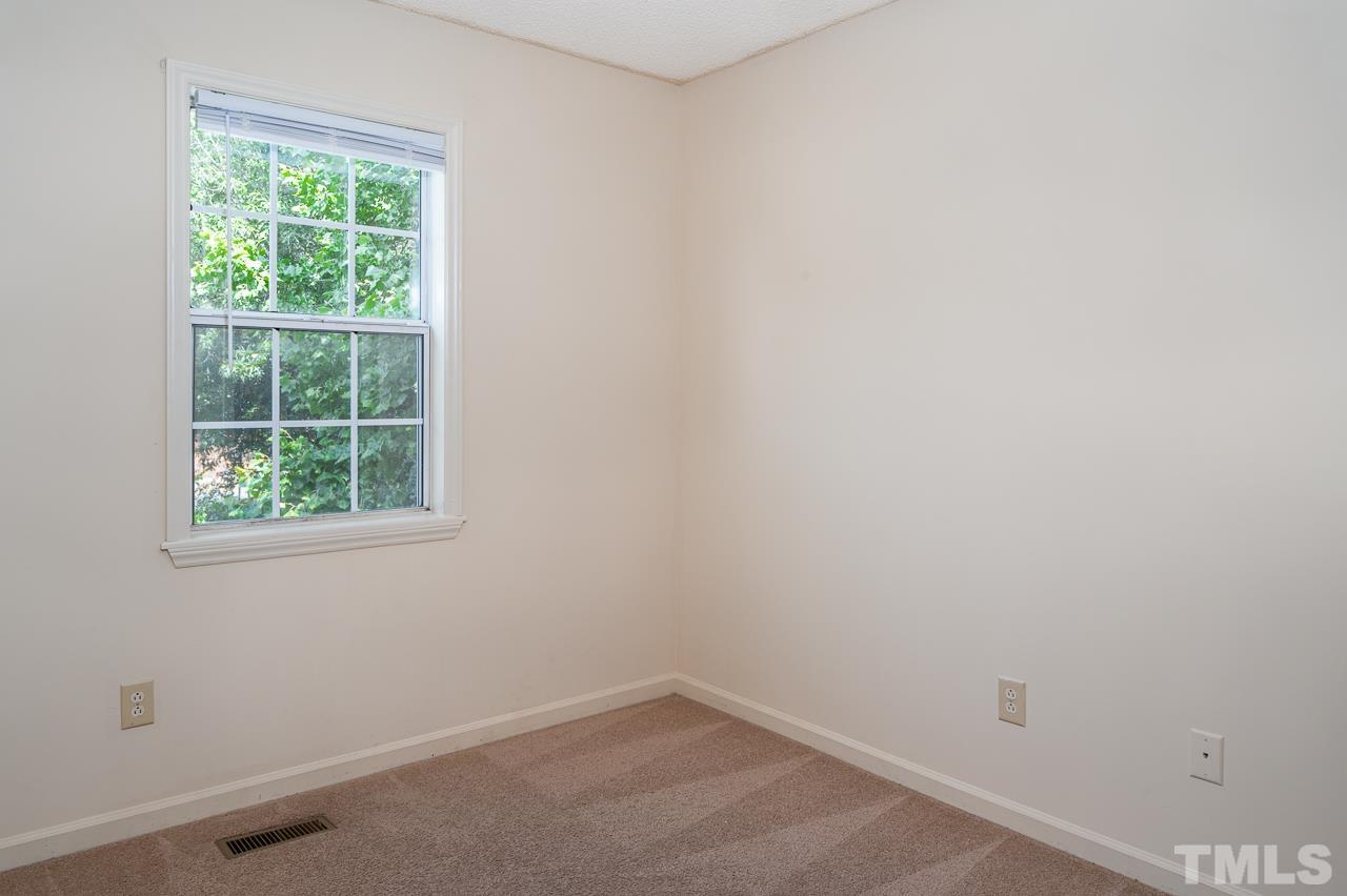 4264 Kaplan Drive Raleigh, NC 27606 - Photo 20 of 23 an empty room with a window