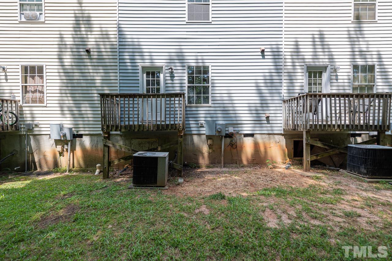 4264 Kaplan Drive Raleigh, NC 27606 - Photo 23 of 23 a front view of a house with a yard