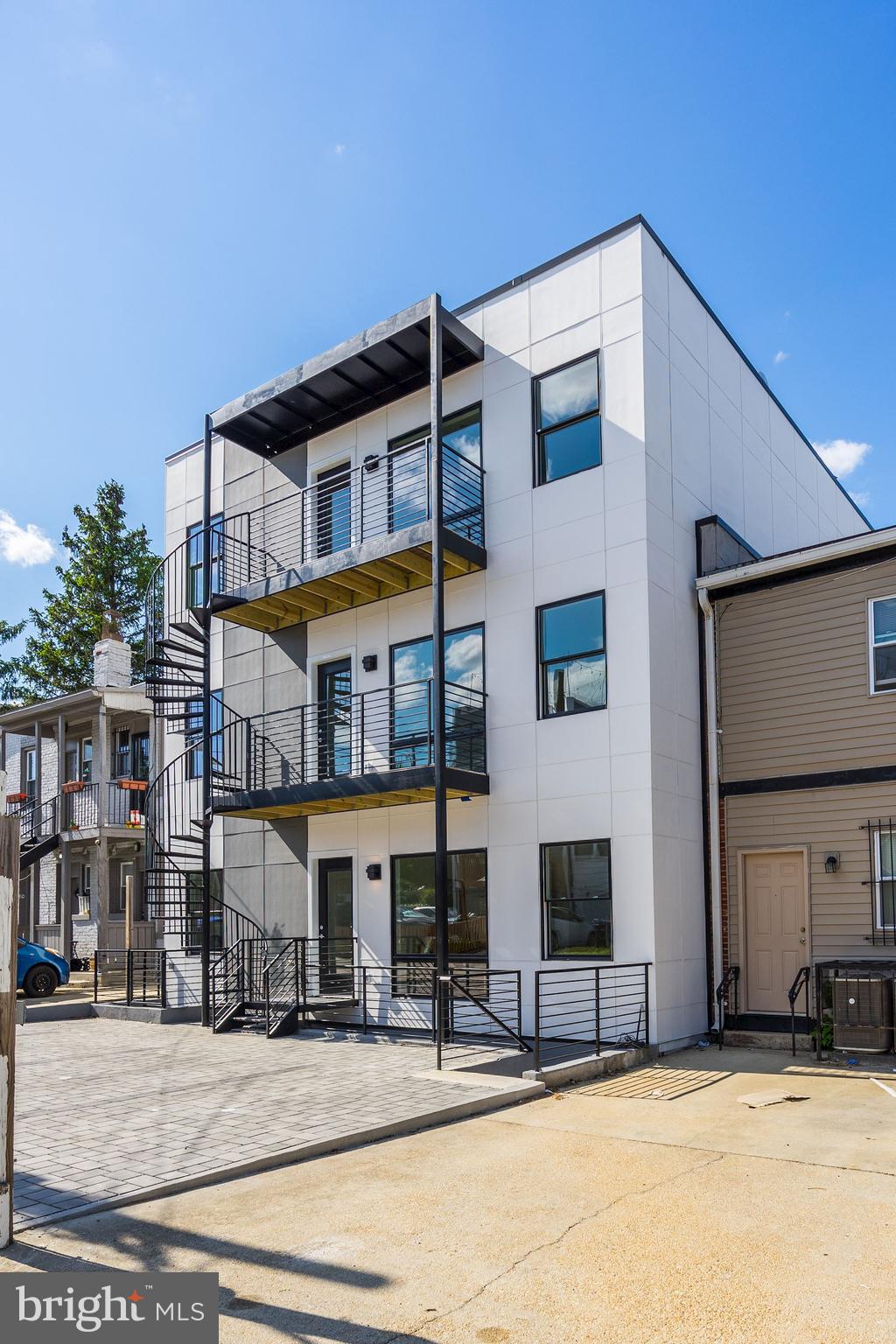 1603 Isherwood Street Northeast, Unit 2 Washington, DC 20002 - Photo 23 of 24 a front view of a building with street