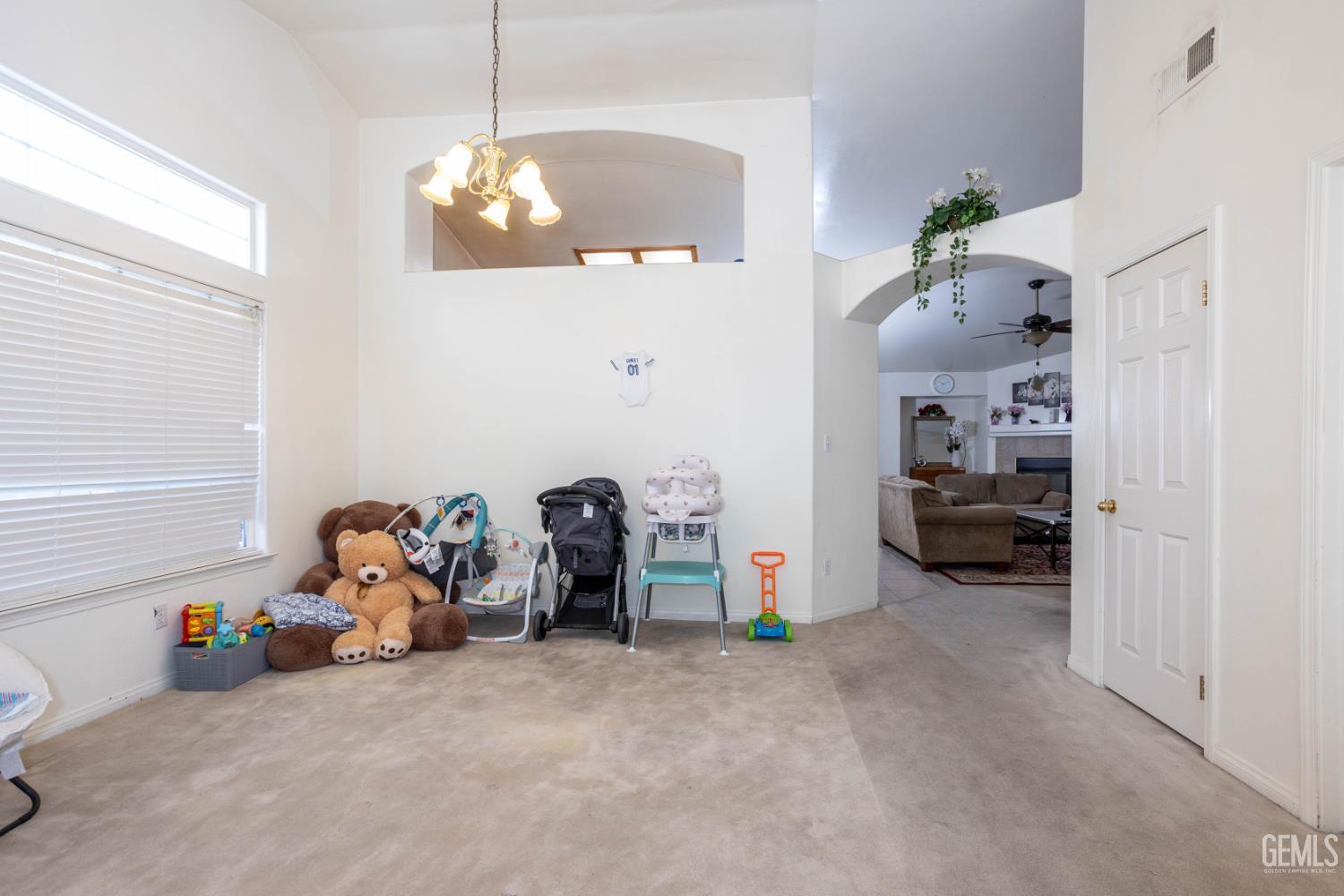 Undisclosed Address Bakersfield, CA 93313 - Photo 5 of 19 a view of a room with toys