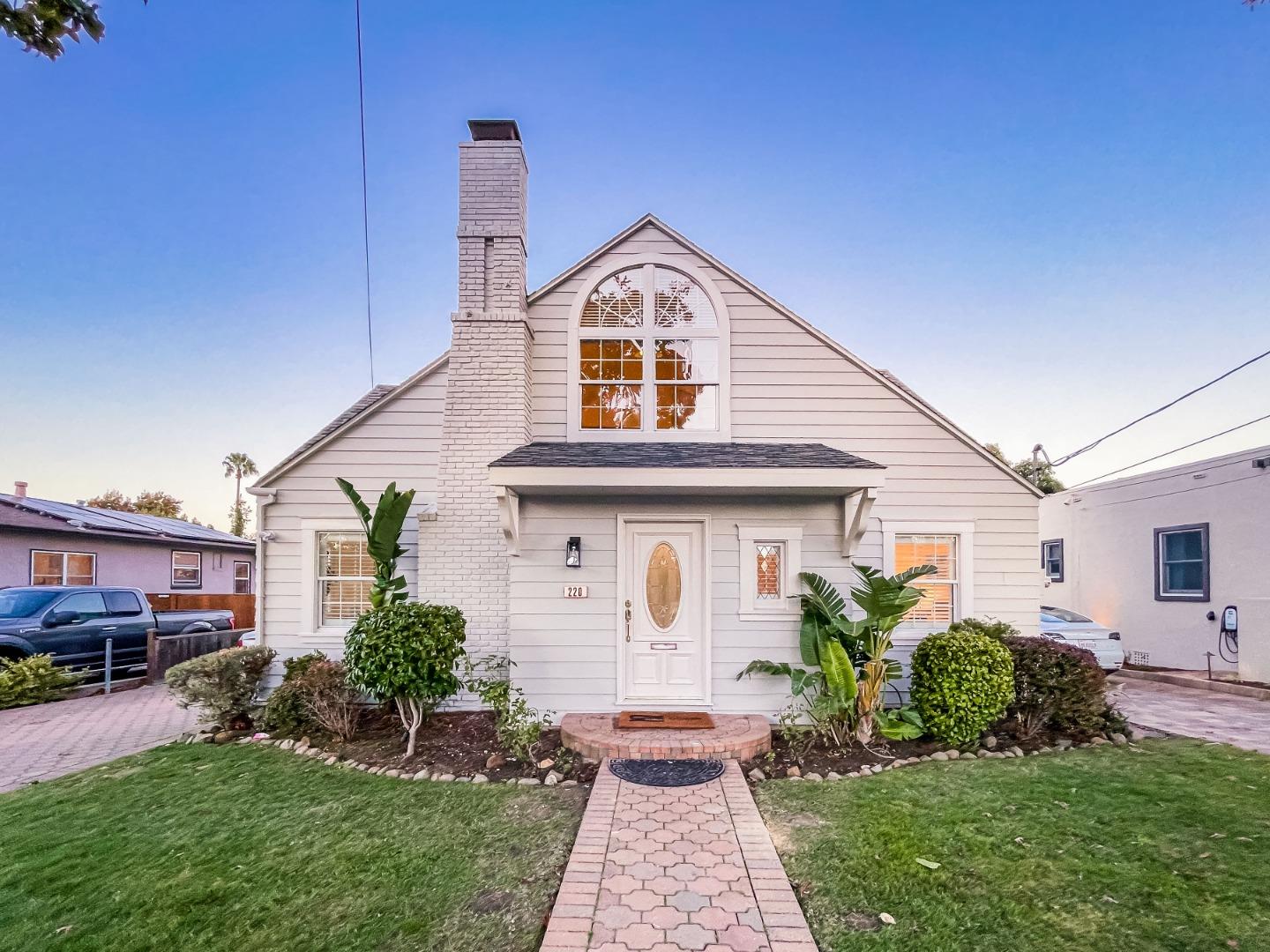 220 Channing Road Burlingame, CA 94010 - Photo 1 of 60 a front view of a house with garden