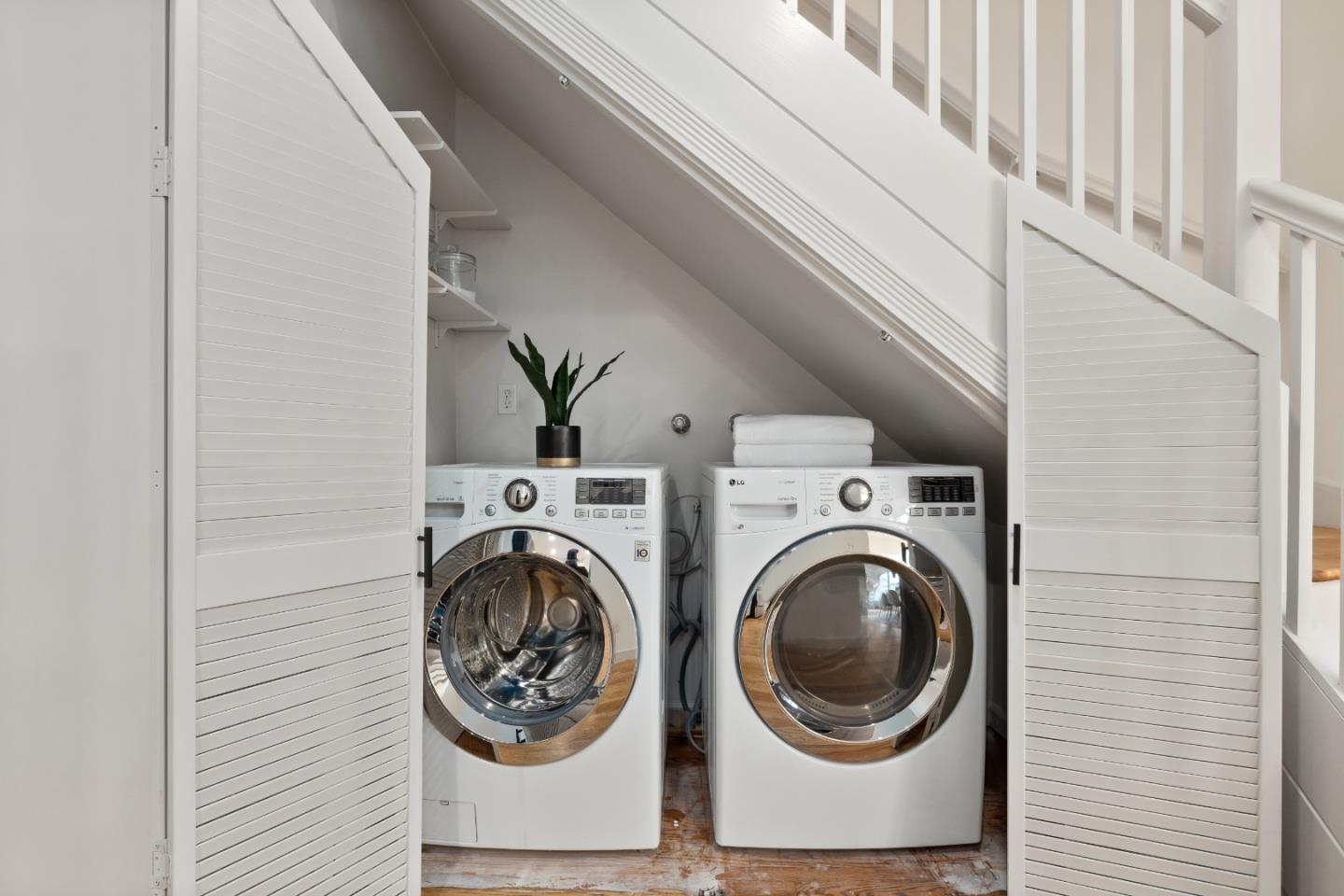 220 Channing Road Burlingame, CA 94010 - Photo 12 of 60 a utility room with dryer and washer