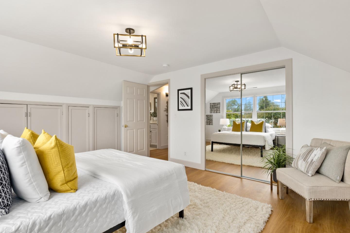 220 Channing Road Burlingame, CA 94010 - Photo 21 of 60 a bedroom with a bed and a couch