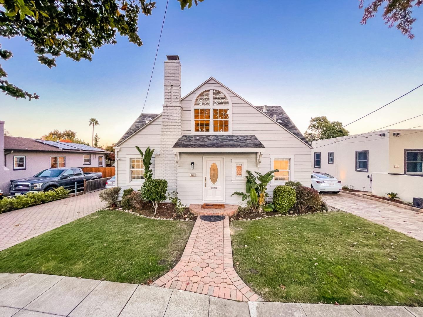 220 Channing Road Burlingame, CA 94010 - Photo 4 of 60 a front view of a house with a yard