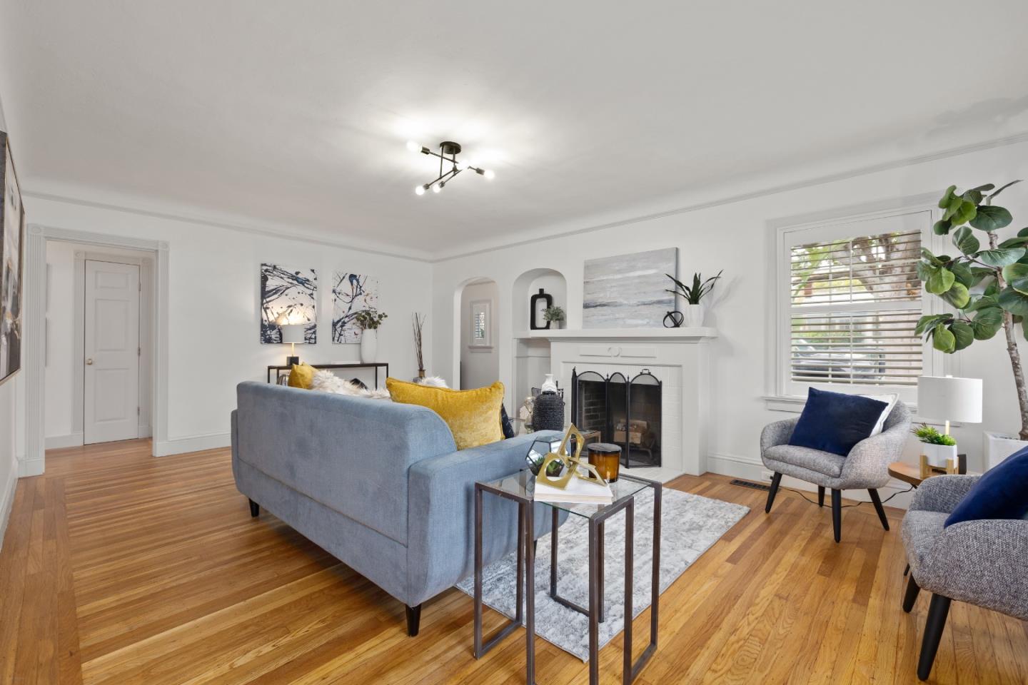 220 Channing Road Burlingame, CA 94010 - Photo 6 of 60 a living room with furniture and a fireplace