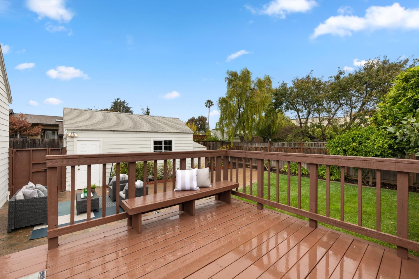 220 Channing Road Burlingame, CA 94010 - Photo 54 of 60 a view of a wooden deck with a yard